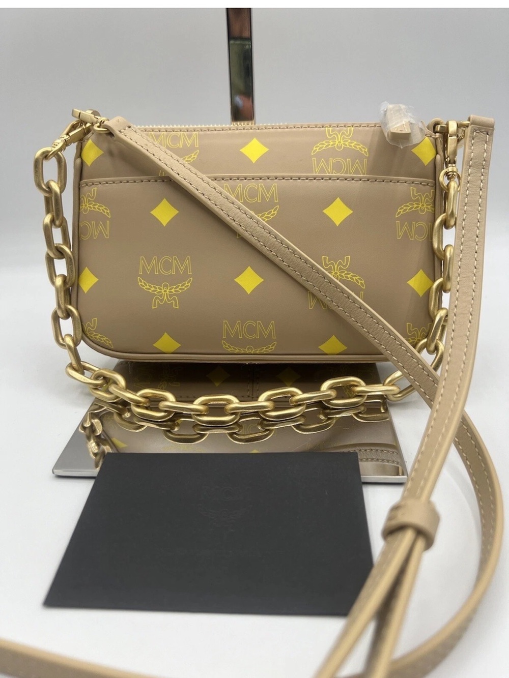MCM Color Splash Logo Croissant Smooth Leather Mini hand
Crossbody Handbag EUC